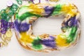 Whole King Cake with Mardi Gras Beads