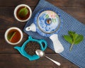 Whole leaf tea, teapot, two cups, mint Royalty Free Stock Photo