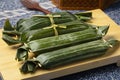 Whole Lemper Ayam, an Indonesian savoury snack made of glutinous rice filled with seasoned shredded chicken Royalty Free Stock Photo