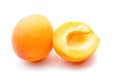 Whole apricot and cut in half close-up on white background Royalty Free Stock Photo