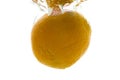 A whole orange thrown into the water. View from under the water Royalty Free Stock Photo