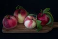 Whole peaches against black from close Royalty Free Stock Photo