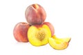 Whole peaches and slices of peaches Royalty Free Stock Photo
