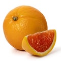 Whole and piece red sicilian orange on a white background. Full depth of field.