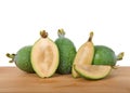 Fresh pineapple guava on a wood table with sliced fruit Royalty Free Stock Photo