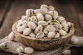 Whole Pistachios on wood Royalty Free Stock Photo