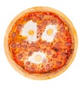Whole pizza with beef sausages, eggs and bacon or Brunch pizza on a round wooden platter isolated on white background, top view Royalty Free Stock Photo