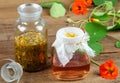 Making tincture from Tropaeolum majus, also called garden nasturtium or Indian cress