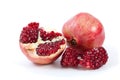 Whole pomegranate, half and pieces