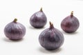 Whole purple figs. White background Royalty Free Stock Photo