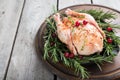 Whole raw chicken on wooden cutting board. raw chicken carcass Royalty Free Stock Photo