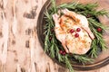 Whole raw chicken on wooden cutting board. raw chicken carcass Royalty Free Stock Photo