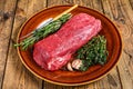 Whole Raw fillet Tenderloin beef meat for steaks. wooden background. Top view