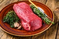 Whole Raw fillet Tenderloin beef veal meat for steaks. wooden background. Top view