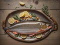 Whole raw fish with lemon, rosemary food