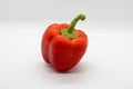 Whole Red Bell Pepper (Capsicum) isolated on a white background