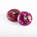 A whole red flat onion isolated on a white background