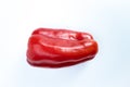 Whole red pepper on background