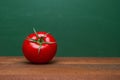 Whole Red Tomato On A Wooden Table. Green Background. Organic Food. Cooking Ingredients. Pomodoro Timer