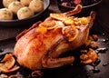 Whole roast duck with orange slices Royalty Free Stock Photo