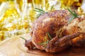 Whole Roasted Chicken on Dinner Table Royalty Free Stock Photo