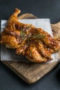 Whole roasted chicken rosemary. grilled barbecue delicious food on dining table at holiday celebrate