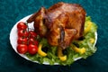 Whole roasted chicken served with fresh vegetables Royalty Free Stock Photo