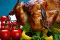 Whole roasted chicken served with fresh vegetables Royalty Free Stock Photo