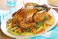 Whole roasted chicken with vegetables Royalty Free Stock Photo