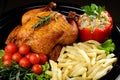 Whole roasted chicken with vegetables Royalty Free Stock Photo