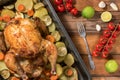 Whole roasted chicken and vegetables Royalty Free Stock Photo