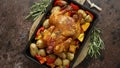 Whole roasted turkey or chicken with pepper, pumpkin, potatoes, carrots