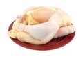 Whole roasting chicken on plate Royalty Free Stock Photo