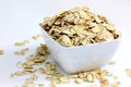 Whole Rolled Oats in White Bowl Royalty Free Stock Photo