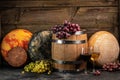 Whole round Head of parmesan or parmigiano hard cheese and wine on a wooden background. farmer market. place for text Royalty Free Stock Photo