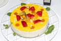 Whole round sliced orange and vanilla diplomat cake or tart Royalty Free Stock Photo