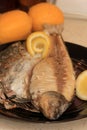 Whole on salt cooked fish with skin removed on one side .Whole fish cooked in a salt