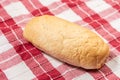 Whole sandwich bread on the kitchen table clothe