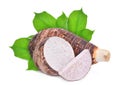 Whole and slice with green leaves of taro root isolated Royalty Free Stock Photo