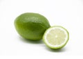 whole and slice green Lemons isolated on white background Royalty Free Stock Photo