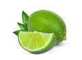 Whole and slice green lime with green leaves isolated on white