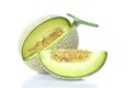 whole and slice of japanese melons, green melon or cantaloupe me Royalty Free Stock Photo