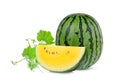 Whole and slice yellow watermelon with green leaf isolated