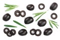 Whole and sliced black olives with rosemary leaves isolated on white background. Top view. Flat lay pattern Royalty Free Stock Photo