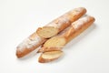 Whole and sliced French baguettes isolated on white background Royalty Free Stock Photo
