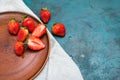 Whole and sliced fresh red strawberries in ceramic plate on tabletop Royalty Free Stock Photo