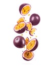 Whole and sliced ripe passion fruit in the air, isolated on a white background Royalty Free Stock Photo