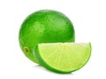 Whole and slices fresh green lime isolated on white Royalty Free Stock Photo