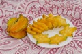 Whole And Slices Of Star Fruits