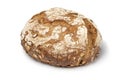 Whole sourdough loaf of bread with pumpkin seeds close up on white background